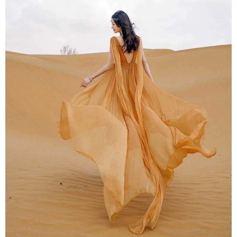 Spring Autumn New Women Dress Xinjiang Qinghai Xizang Desert Island Travel Chiffon V-neck Champagne Gold Backless Tuxedo Dress