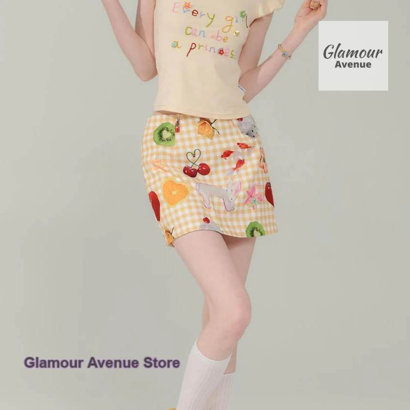 American retro cartoon fruit and animal print short skirt female summer new fashion design sense niche high waist slim skirt.