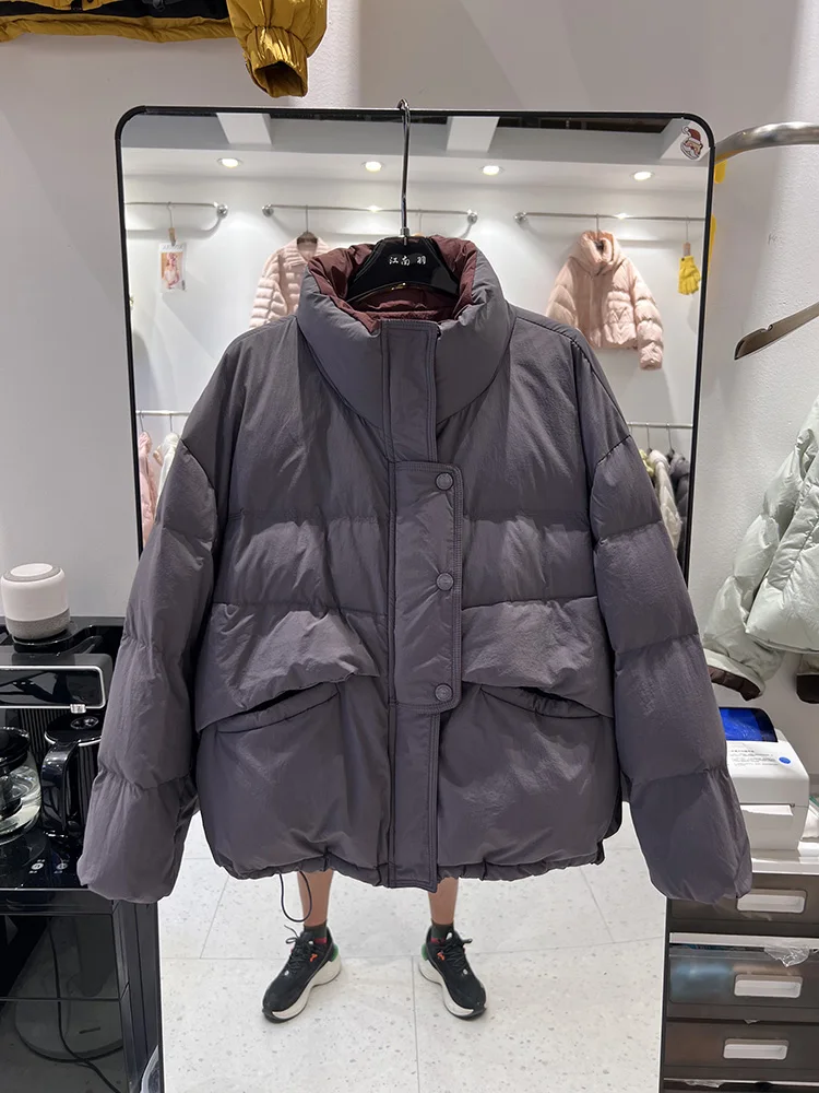 سترة كاجوال متعددة الاستخدامات للنساء 2025 سترة جديدة بياقة واقفة وحاشية قصيرة برباط على الموضة باللون الأبيض