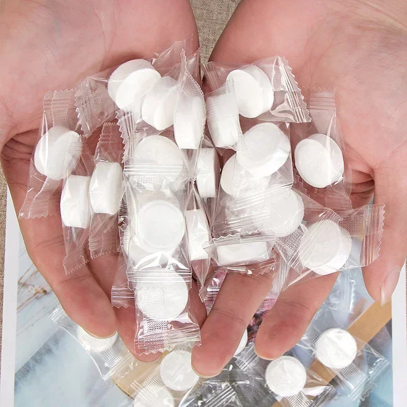 Toalla comprimida portátil desechable para limpieza Facial, toallas suaves, Mini algodón, suministros prácticos para viajes al aire libre y Hotel, 10-100 Uds.