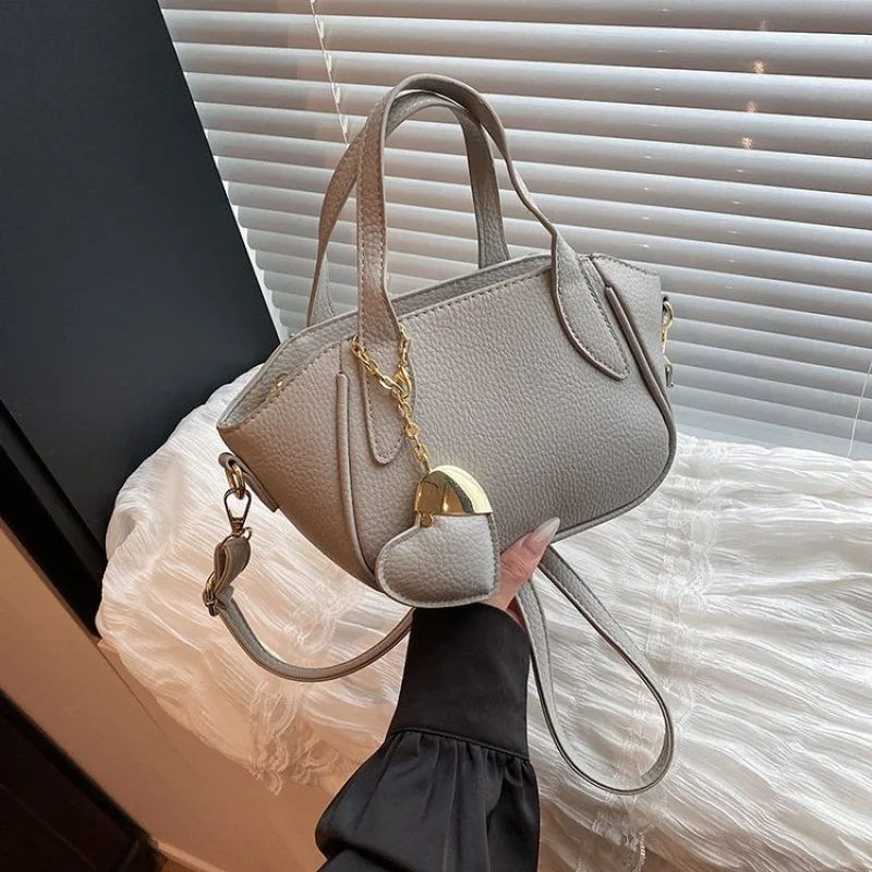 

Яркая 2025, новая женская роскошная брендовая кожаная сумка, известный дизайнер, популярная классическая повседневная сумка ​