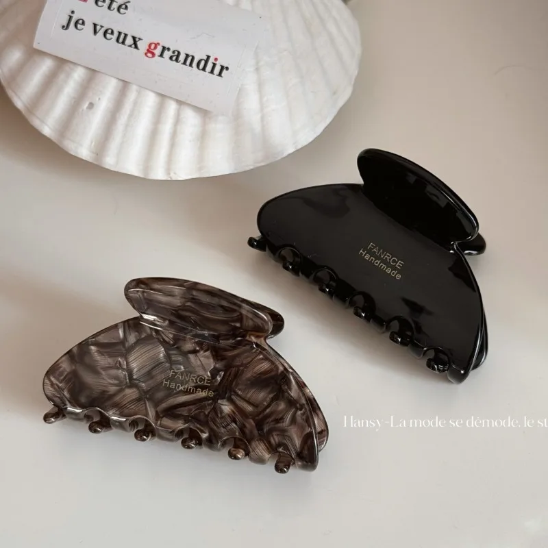 

Korean retro fan-shaped hairpin medium half-tie hair clip on the back of the head high-end shark clip hair clip headgear.