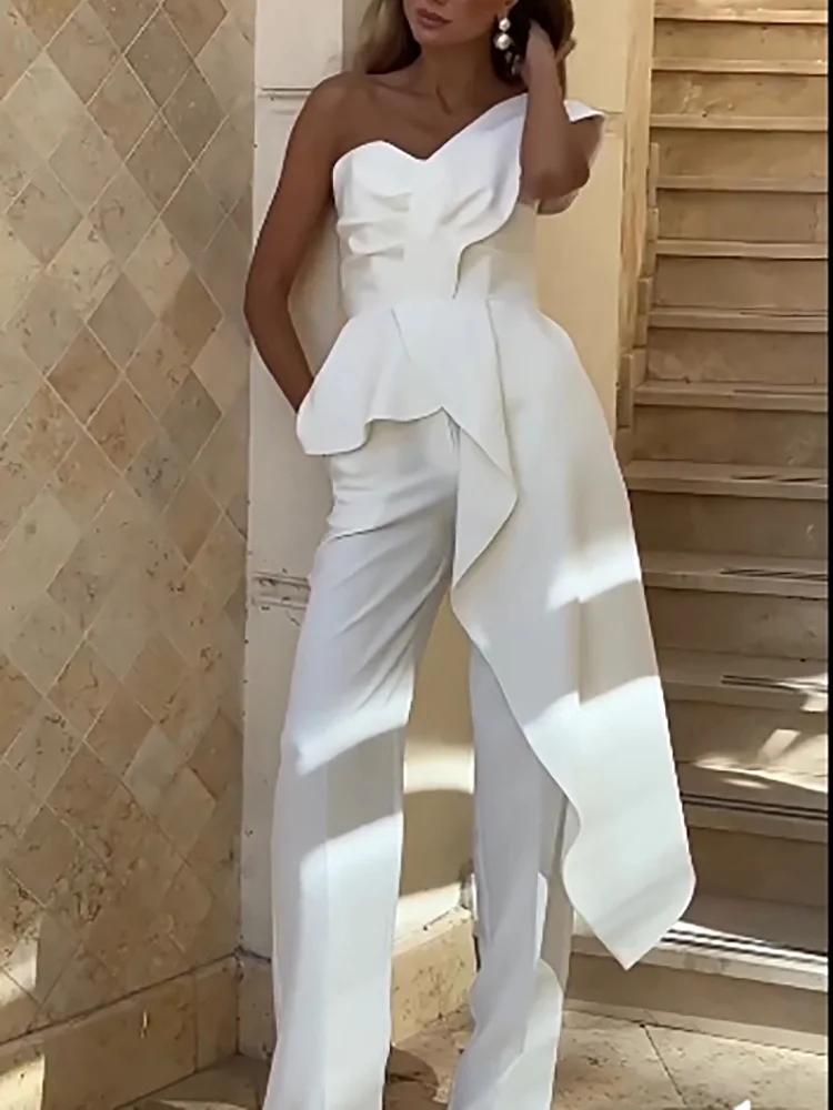 Primavera Verano elegante traje de oficina sólido mujeres Sexy sin tirantes volante Top y pantalones largos conjunto verano sin mangas hueco Irregular 2 uds