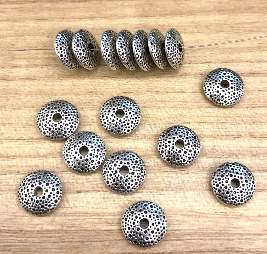 

40pcs 10*3mm Zinc Alloy metal tibetan silver vintage spacer beads HW2620