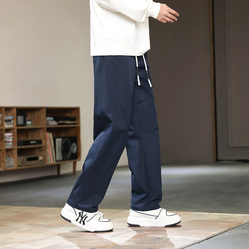 Pantalones de pierna ancha curvados de poliéster para hombre, Pantalones rectos cómodos y versátiles con diseño de cordón, Otoño e Invierno 2025, talla grande 5XL