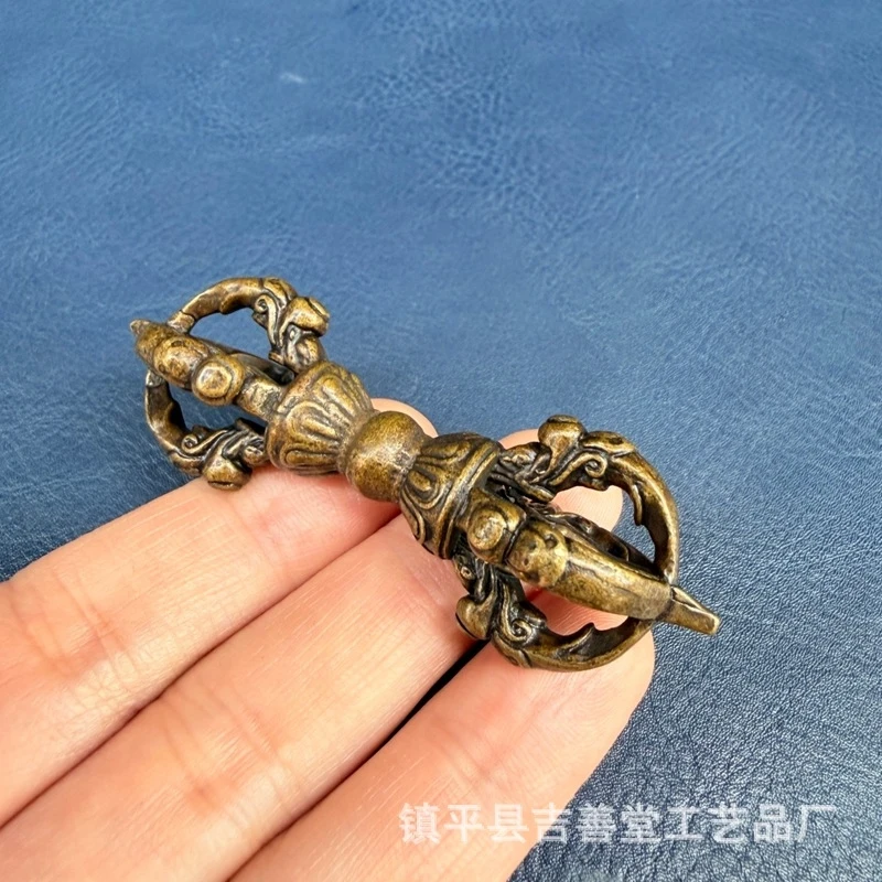 - brass five-pronged , puja , Tibetan-style vajra scepter pendant