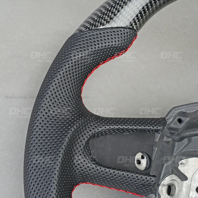 Suitable for Audi B7 A5, carbon fiber + perforated leather, red positioning line, car modification steering wheel