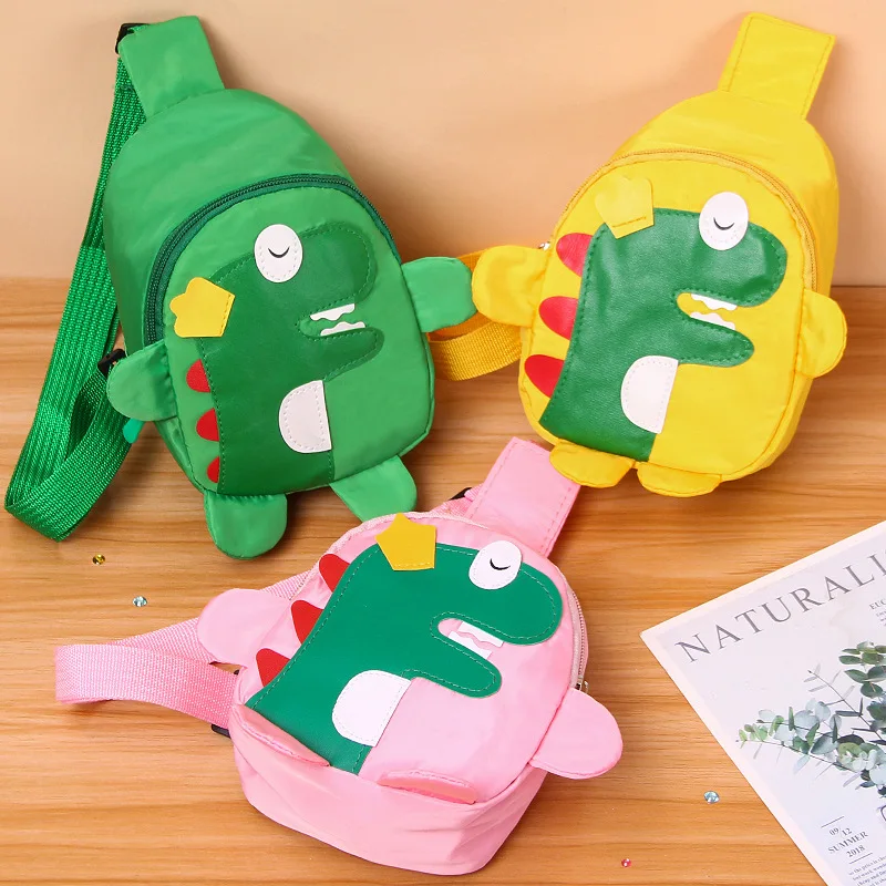 Bolso pequeño de lona con dibujos animados para niños y niñas, bandolera pequeña de dinosaurio, a la moda, con arnés para bebés