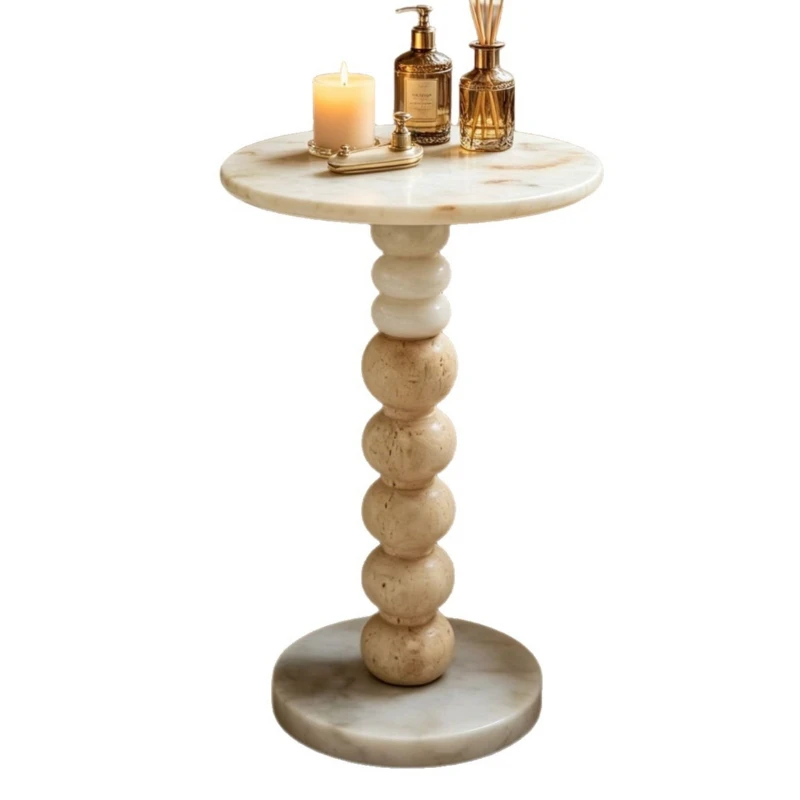 Natural travertine edge table, beaded column, movable small coffee table next to the living room sofa