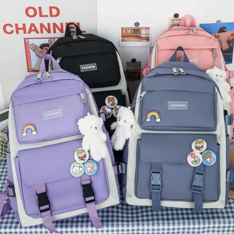 School bag for girls, middle and high school students, elementary school students, four-piece set of simple backpacks