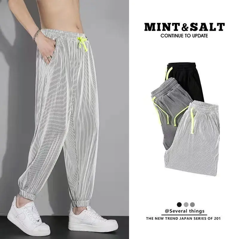 

Летние мужские повседневные брюки свободного покроя из ледяного шелка, тонкие повседневные брюки большого размера с девятью очками, модные спортивные длинные брюки