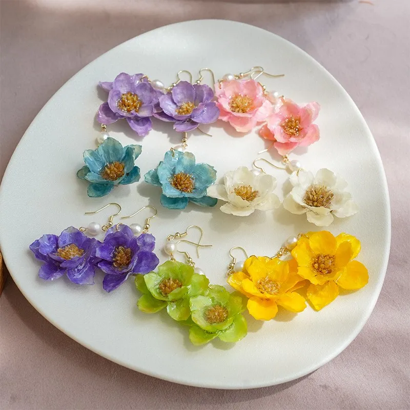 

Epoxy Resin Natural Flower Earrings Unique Multicolor Silver Bell Flower Earrings Handmake Plant Earrings Jewelry Wholesale 2025