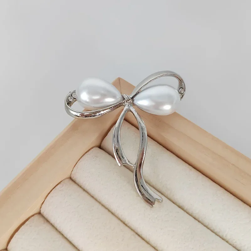 موضة القوس اللؤلؤ بروش للنساء الفاخرة رائعة حجر الراين دعوى الصدار دبابيس حلية مجوهرات اكسسوارات هدايا 2024 تصميم جديد