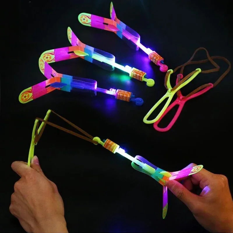 5/10/20pcs Led Light Arrow Helicopter Slingshot Ejection Flying Toy  Kids Adult Mini Flying Toy Flash Rubber Band Catapult Toys view 4