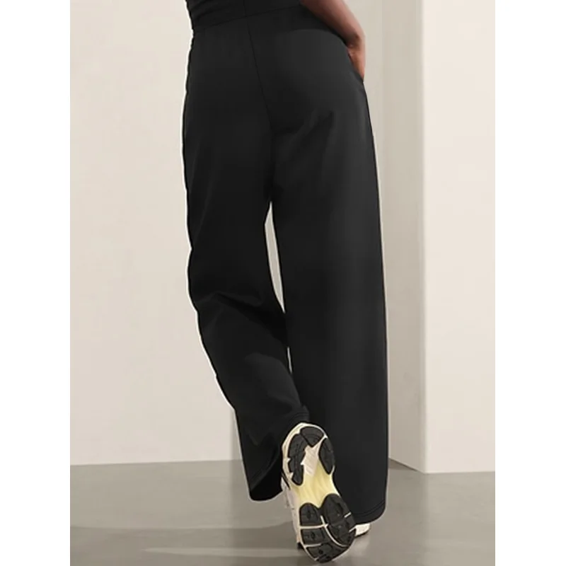 2025 Pantaloni minimalisti alla moda a gamba larga da donna Pantaloni da festa neri dimagranti a vita regolare