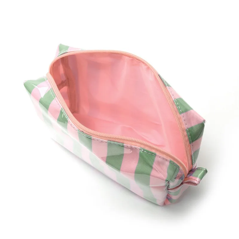 PVC Striped Cosmetic Bag with Tassels and Zipper, Waterproof Travel Toiletry Bag with Built-in Makeup Brush Organizer.