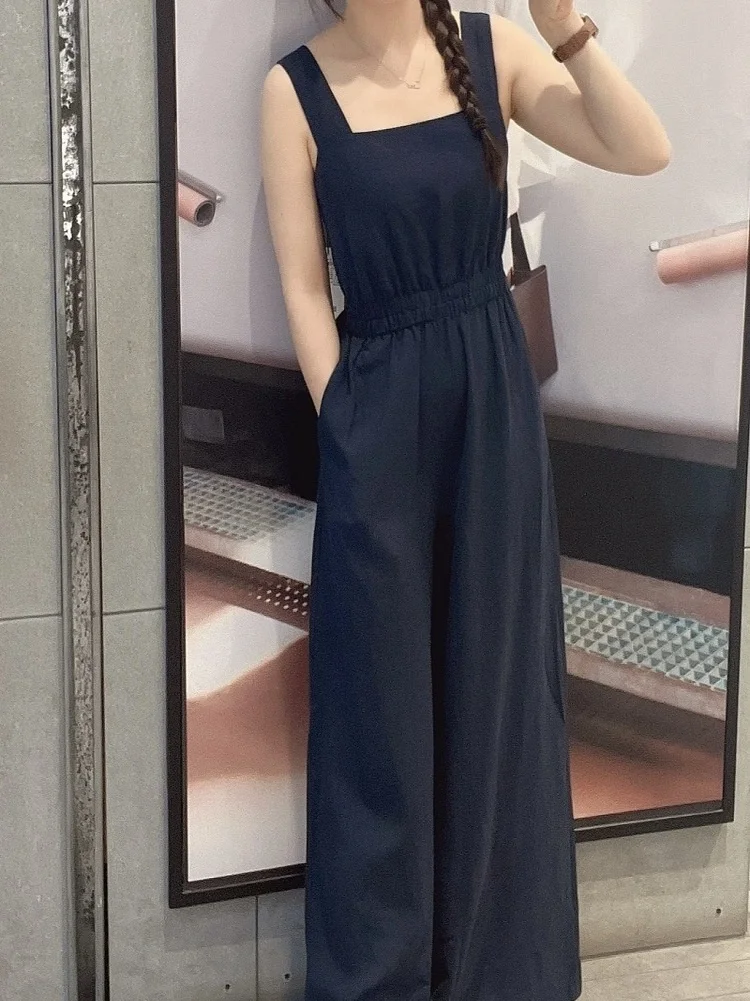 จั๊มสูทผู้หญิงทรงหลวมเอวสูง รุ่นใหม่ประจำฤดูร้อน MM2024 สีน้ำเงินกรมท่า พร้อมสายรัด