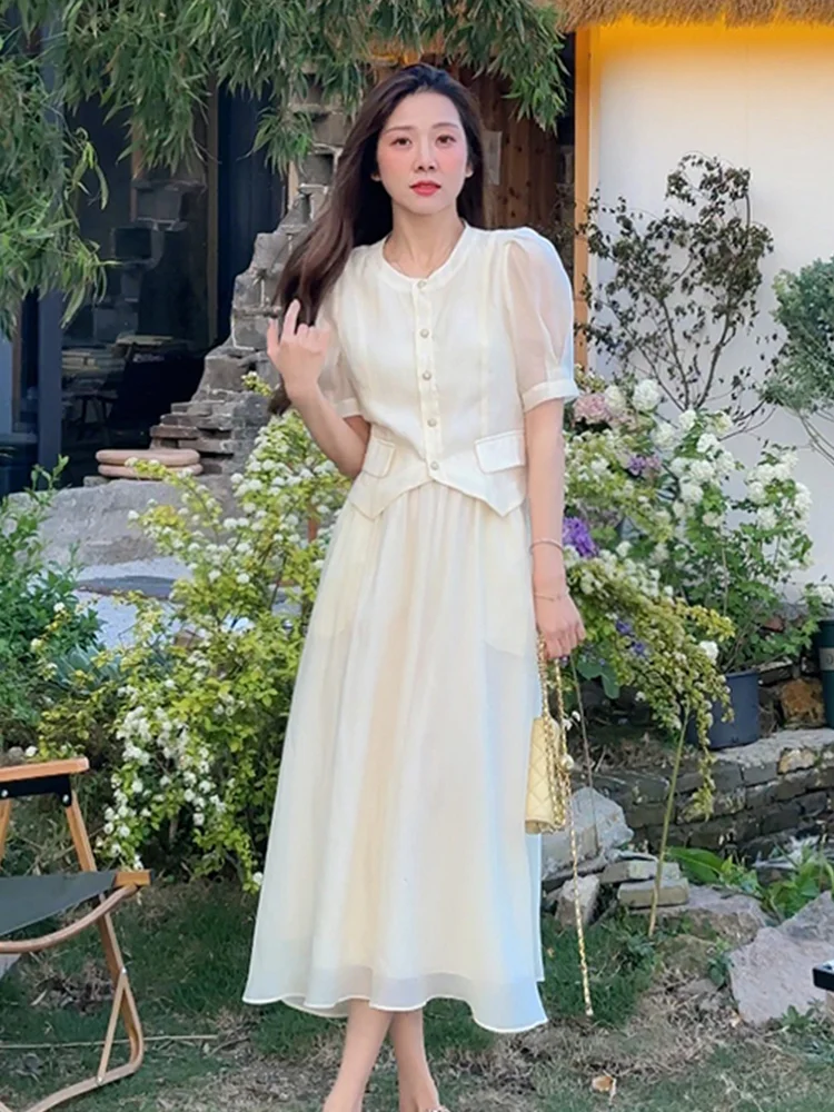 

Элегантный летний комплект 2026: женская модная блузка с рукавами-фонариками и юбка А-силуэта, нежный стиль, полиэстер