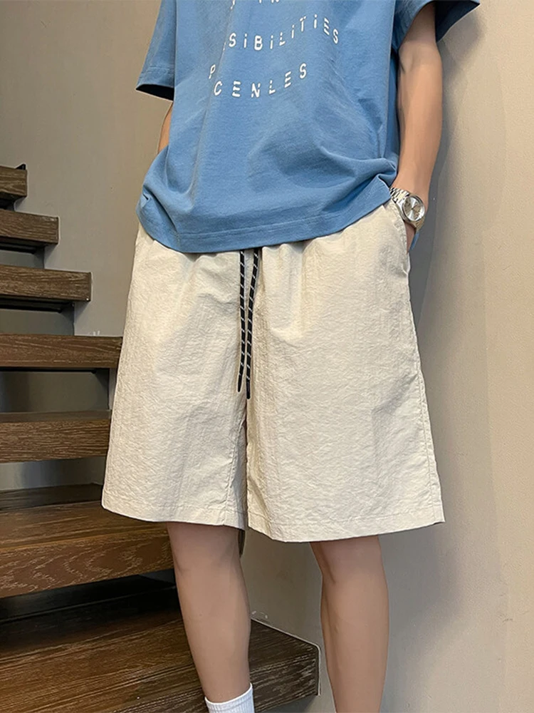 Pantaloncini sportivi da donna con lacci arancioni 2025 Nuovi pantaloni estivi ad asciugatura rapida Pantaloni casual larghi versatili alla moda a cinque quarti