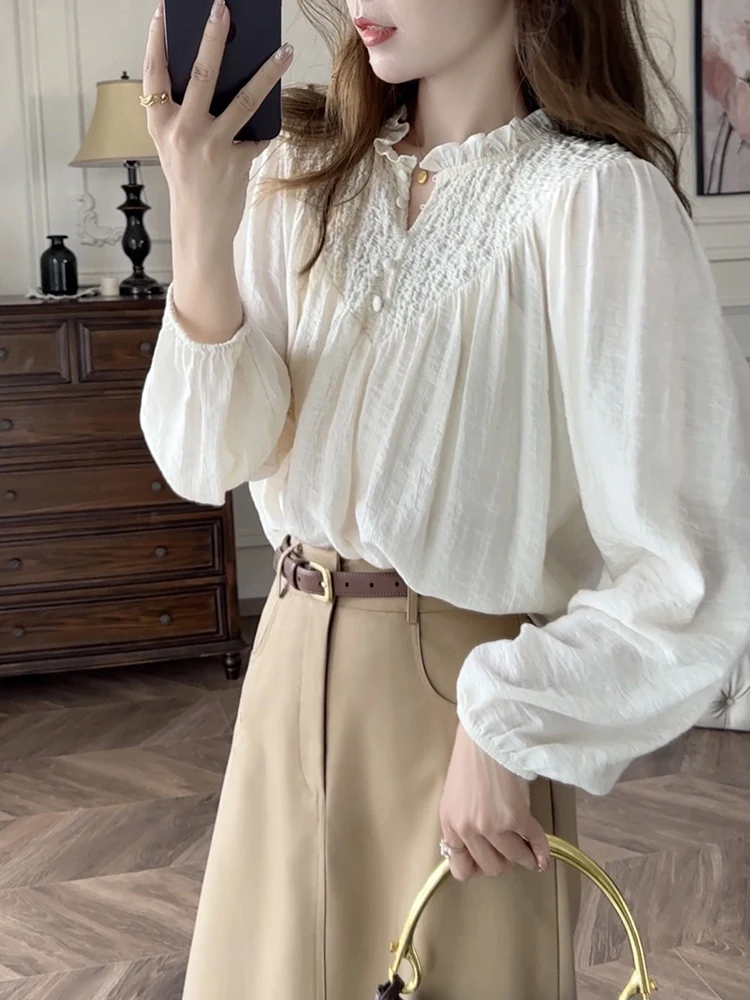 

Zhang ei Spring 2025 White V-ne Texture Design Unique irt Top Korean Sle Loose Fit Long Sve Pure Color Polyester...
