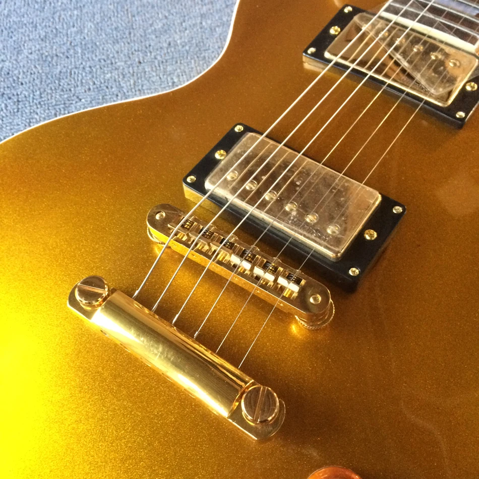 Gold electric guitar, gold hardware with Tune-o-Matic bridge, rosewood fingerboard