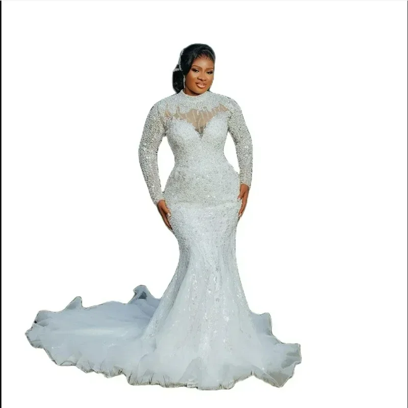 

Индивидуальное свадебное платье в арабском стиле с тяжелой вышивкой, жемчугом и бисером, силуэт «русалка», с длинными рукавами-иллюзиями для невесты