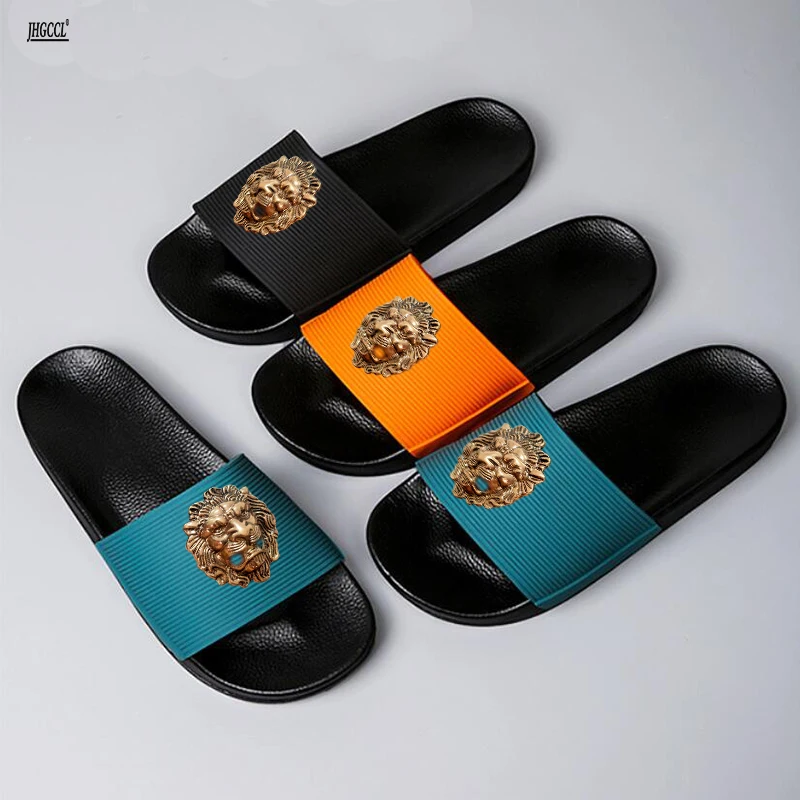 Flat slippers women\'s summer new fashion relief printed metal head beach leisure flip-flops sandalias de mujeres en oferta  T35