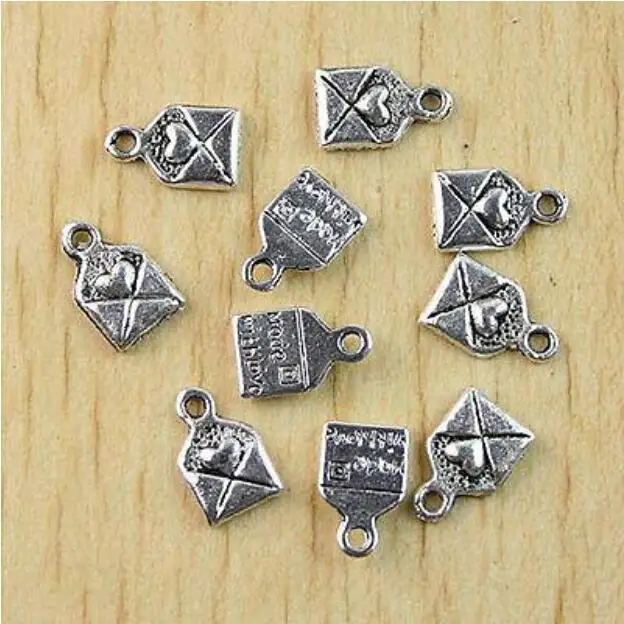 

70pcs 10*6.4mm Tibetan silver"made with love"charms h1030