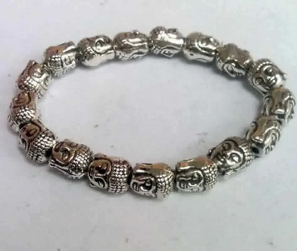 

new hot Tibet Silver Buddha Head Chinese Old Handwork Amulet Elastic Bracelet
