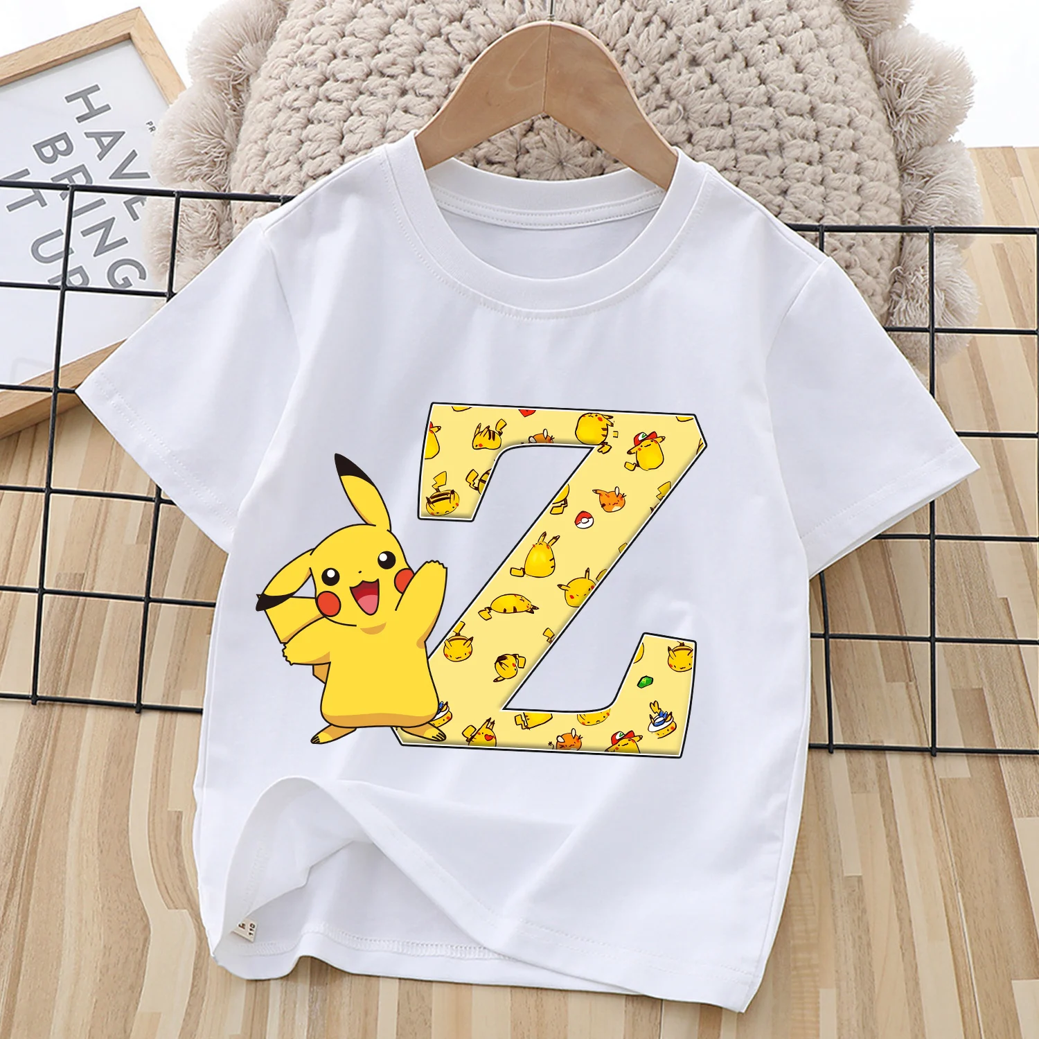 

Футболка с изображением Покемона Пикачу для детей, футболка с надписью в стиле мультфильма, топ с круглым воротником в стиле аниме, белая одежда для мальчиков и девочек, детский подарок