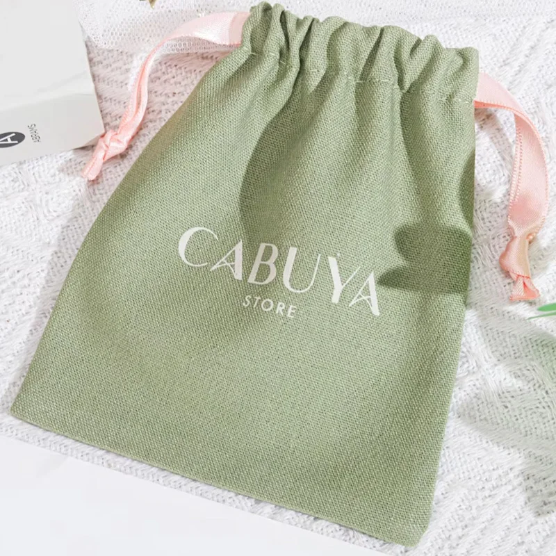 

High Quality Green Cotton Linen Drawstring Skincare Product Perfume Packing Bag Custom Logo Printed Gift Makeup Jute Pouch