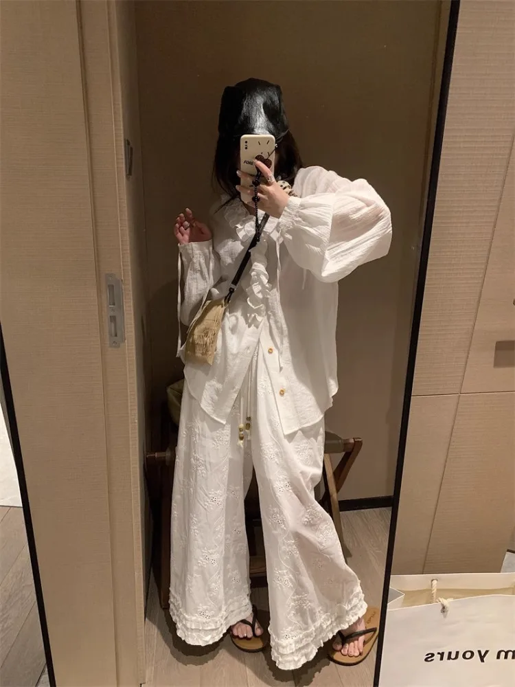 Białe koronkowe spodnie z szerokimi nogawkami, elastyczną talią, luźne, codzienne, o prostym kroju, letnie, nowe, wyszczuplające, damskie, modne.