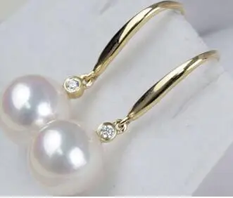 

gorgeous pair of 10-11mm south sea white pearl earring 14K