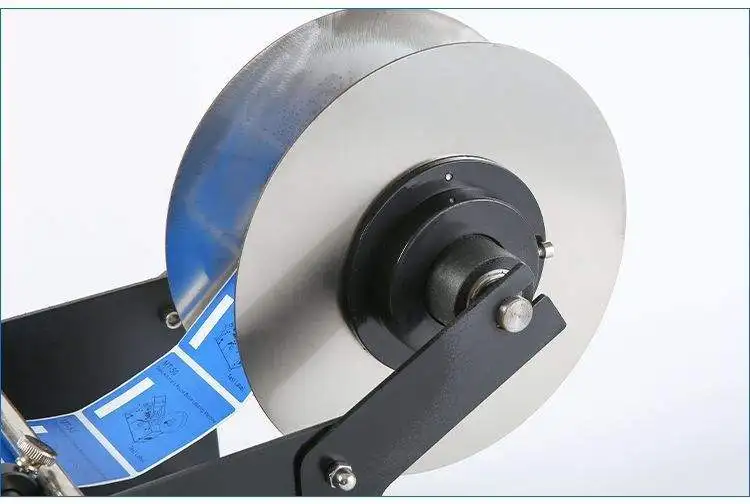 Maszyna do naklejania etykiet ST-76 na okrągłe butelki, wino, plastikowe butelki, mała maszyna pakująca, ręczna maszyna do etykietowania.