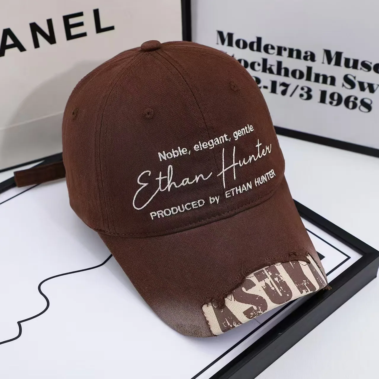 Water-washed retro baseball cap with wide brim, stylish and versatile, perfect for everyday wear.