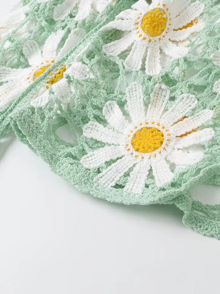 เสื้อผ้าผู้หญิงฤดูร้อนในยุโรปและอเมริกาหวานอเนกประสงค์เดซี่ถักคาร์ดิแกนกลวงลูกไม้ขึ้นเสื้อคาร์ดิแกนคอวี