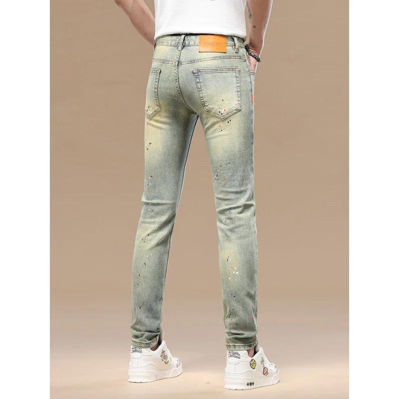 Pantalones vaqueros retro desgastados de alta gama para hombre, ajustados, de nueve pulgadas, pies pequeños, tinta salpicada, novedad de Primavera/verano 2025, pantalones elásticos de moda