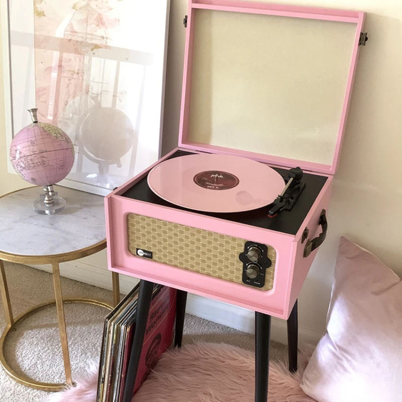 Bluetooth vinyl record player, phonograph on the ground, retro home record player, delivering records