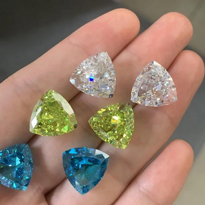 

Ruihe New 5A Quality Trillion Shape Crushed Ice Cutting Cubic Zirconia Gemstone CZ Apple Green White and Blue Color