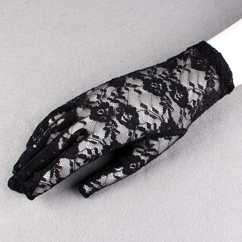 

Lace gloves female autumn thin sexy flowers hollowed out breathable thin stage performance shading driving etiquette bride
