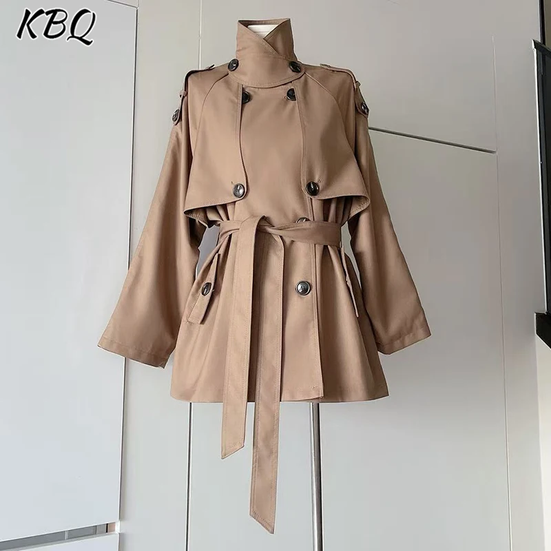 

KBQ Solid Spliced Button Tunic Design Sense Trench Coat for Women Stand Collar Long Sleeve Minimalist Chic Coat Female Fashion