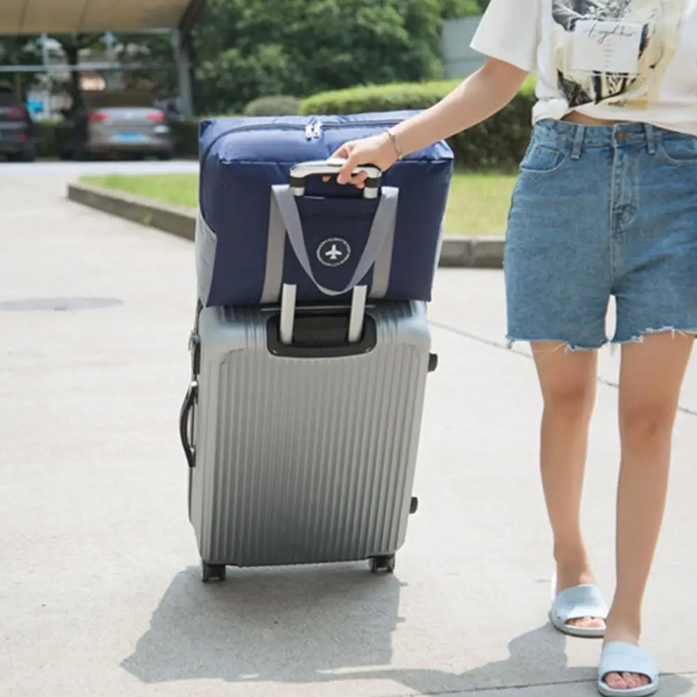 Borsa portaoggetti portatile borsone borsa da viaggio in poliestere di grande capacità borsa da viaggio pieghevole con cerniera borse da viaggio aereo