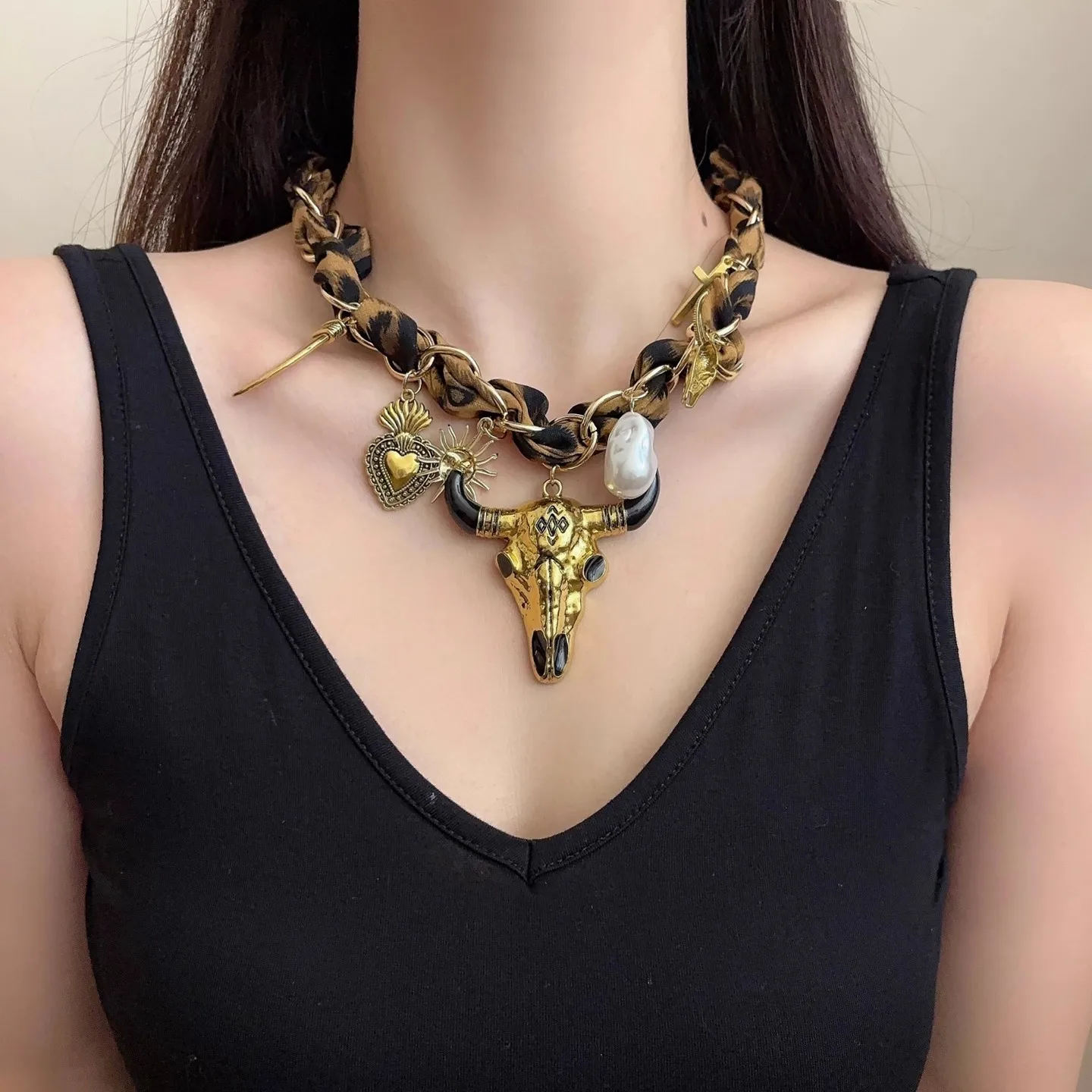 European and American exaggerated design vintage silk scarf with a bull head pendant necklace, for travel and vacation jewelry.
