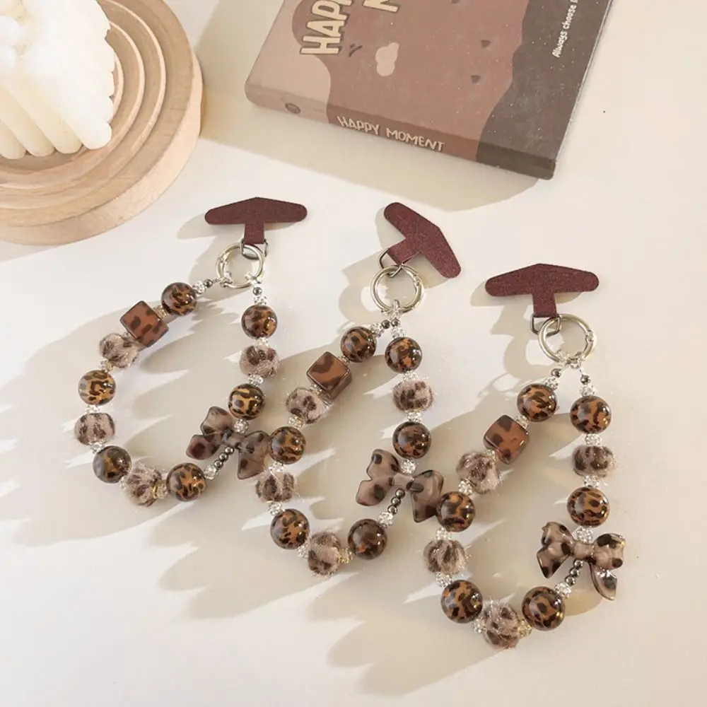 

Противоскользящий ремешок для телефона с леопардовым принтом и шариком, простой шнурок для мобильного телефона, стильный ремешок-бант на запястье