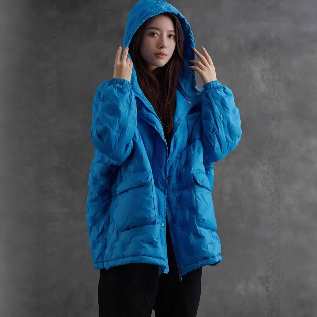 سترة نسائية شتوية جديدة لعام 2025 بغطاء للرأس سترة فضفاضة بغطاء للرأس باللون الأبيض