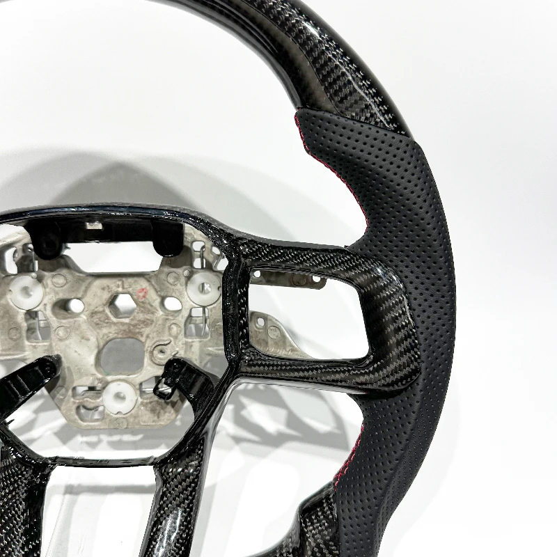 Sporty carbon fiber steering wheel for the new Ford Mustang view 2