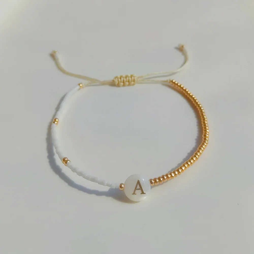 Beaded bracelet originality Sea shell letter Hand knitting Design Adjustable Bohemia Tide Simple Female Rice bead bracelet