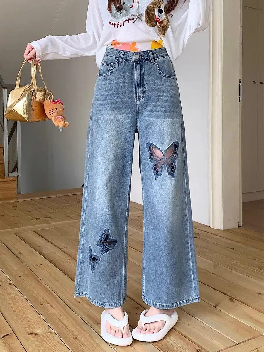 calca-jeans-feminina-retro-borboleta-vazada-de-cintura-alta-solta-para-corpo-tipo-pera-tamanhos-grandes-estilo-social-primave