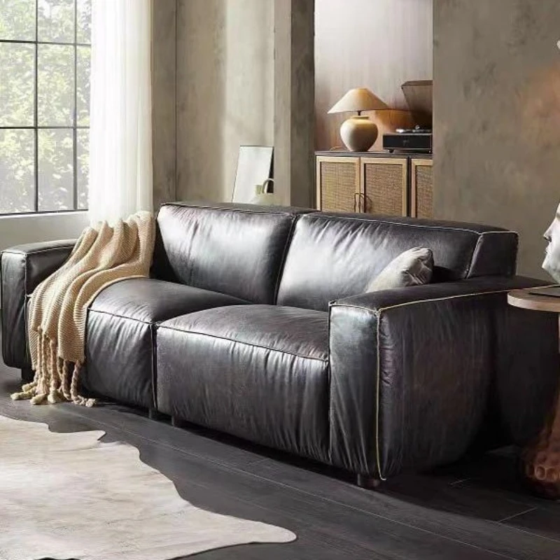 

Medieval black leather sofa three-person straight row down Italian leather sofa