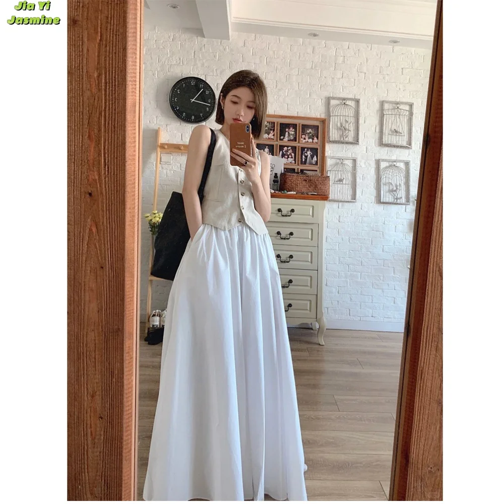 French Haute Couture V-neck Minimalist Commuting Suit Vest Women\'s Summer Western-style Fashionable White Long Skirt Fashion Set